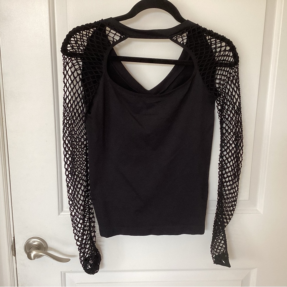 Venus black form fitted top with fishnet arms.